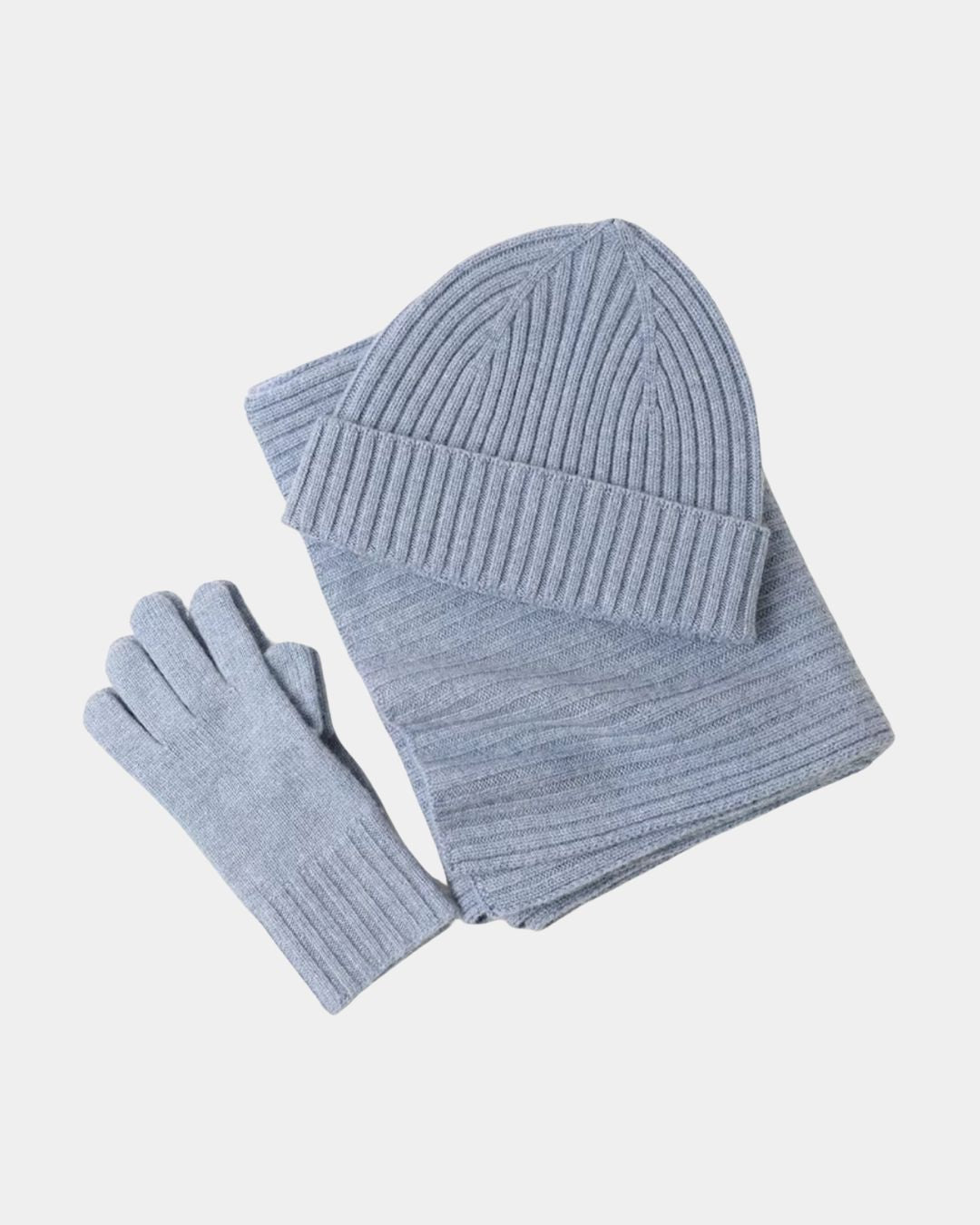 Light blue cashmere winter set featuring a ribbed knit beanie, matching scarf, and soft knit gloves.