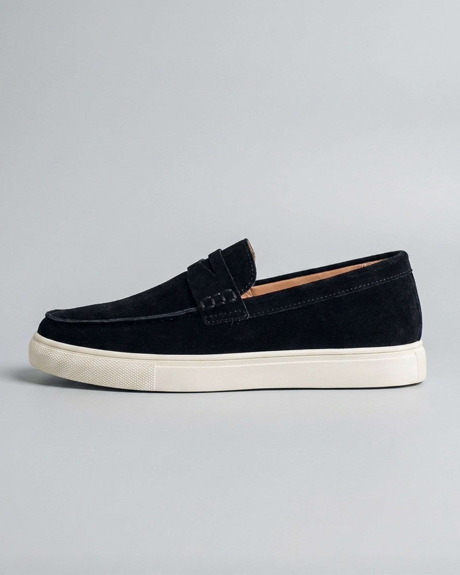 Side view of Dunley men's black penny loafer