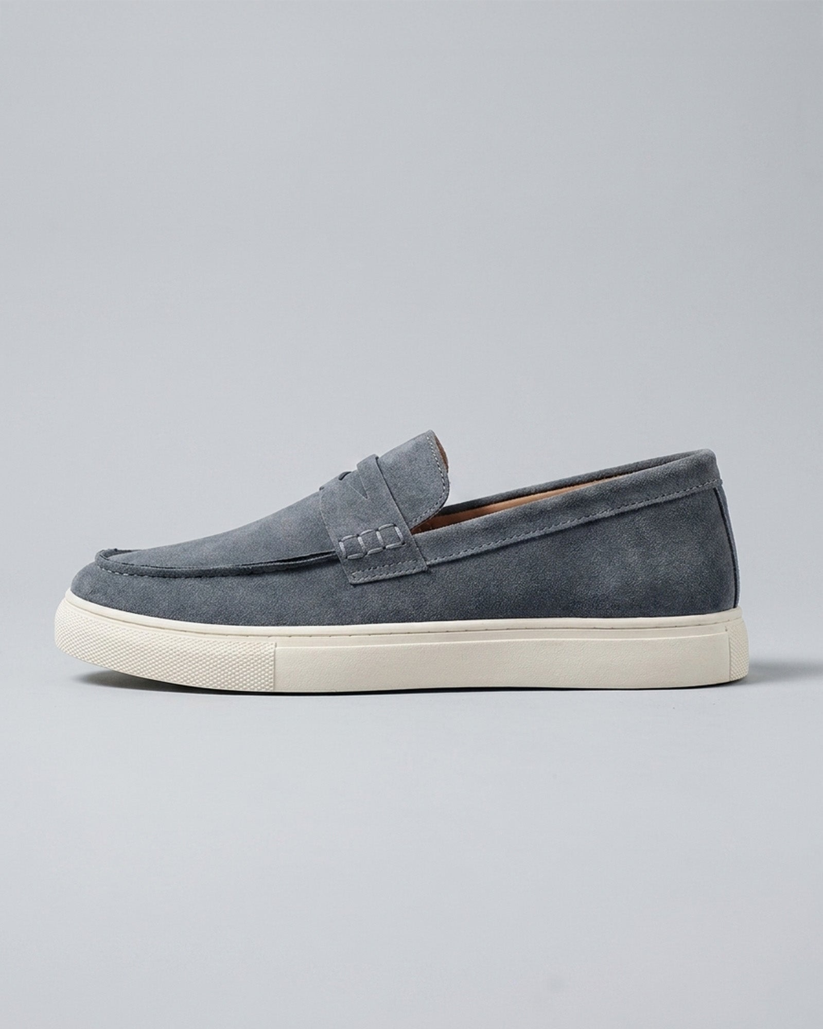 Side view of Dunley men's steel blue penny loafer
