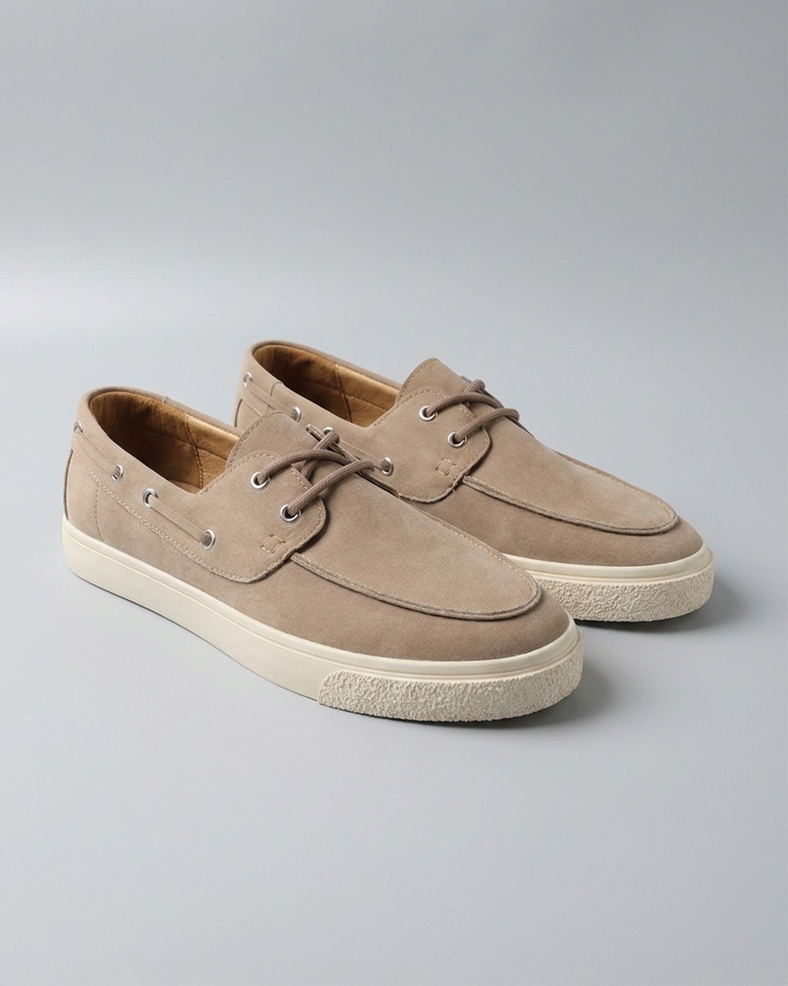 Pair of Harwich men's beige suede boat shoe sneakers with cream cupsole