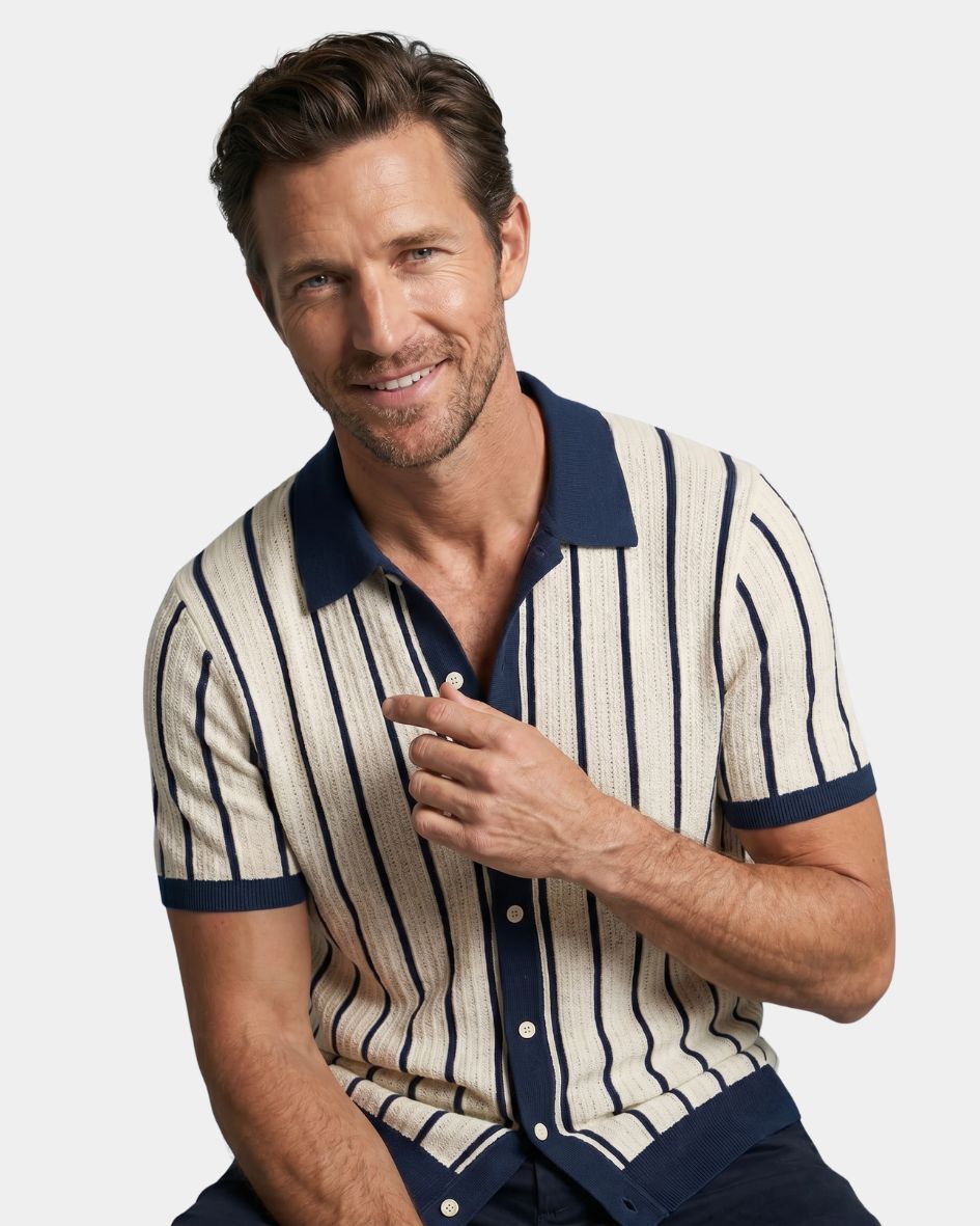 Man wearing a striped shirt with a white background