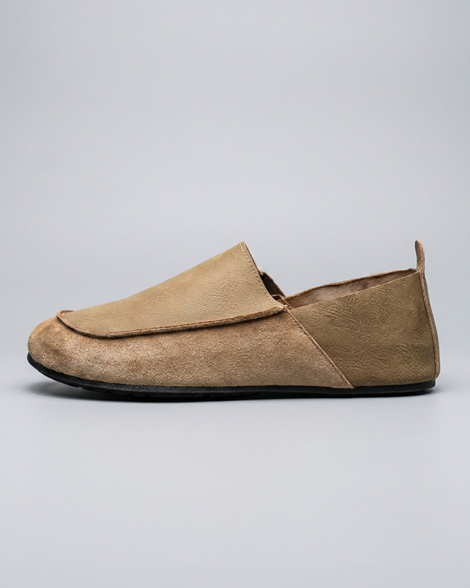 Side view of Luca men's beige relaxed slip-on loafer with contrast vamp panel