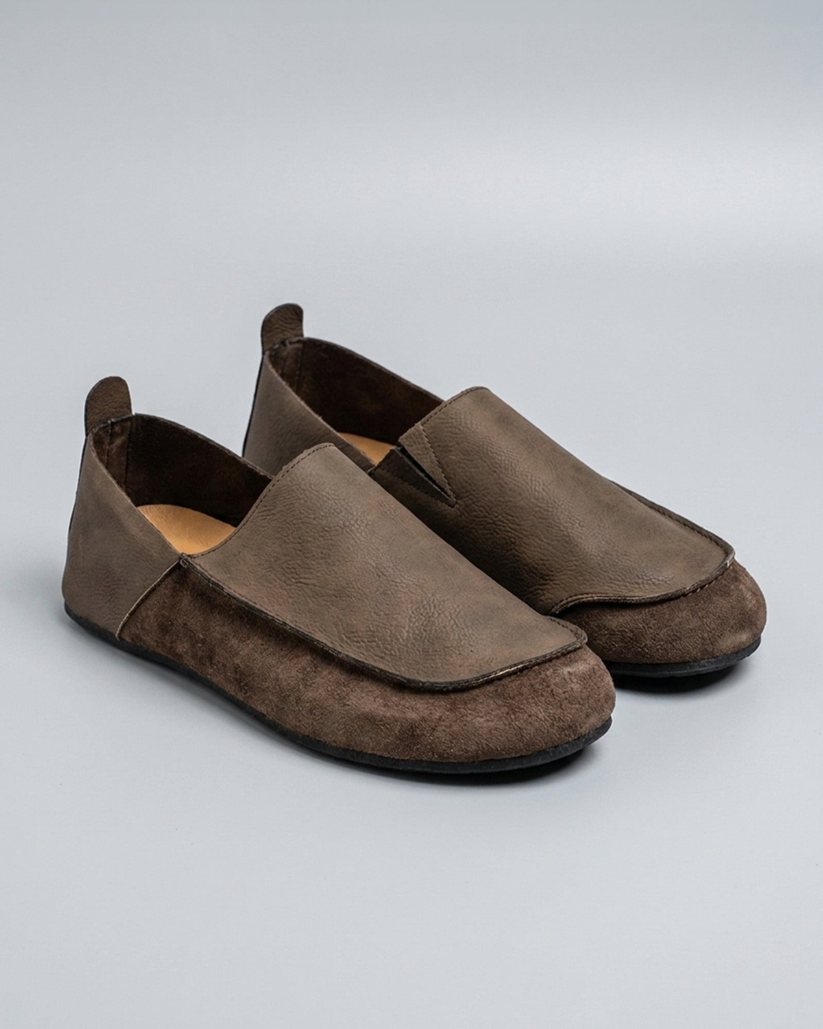 Pair of Luca men's brown relaxed slip-on loafers with contrast vamp panel