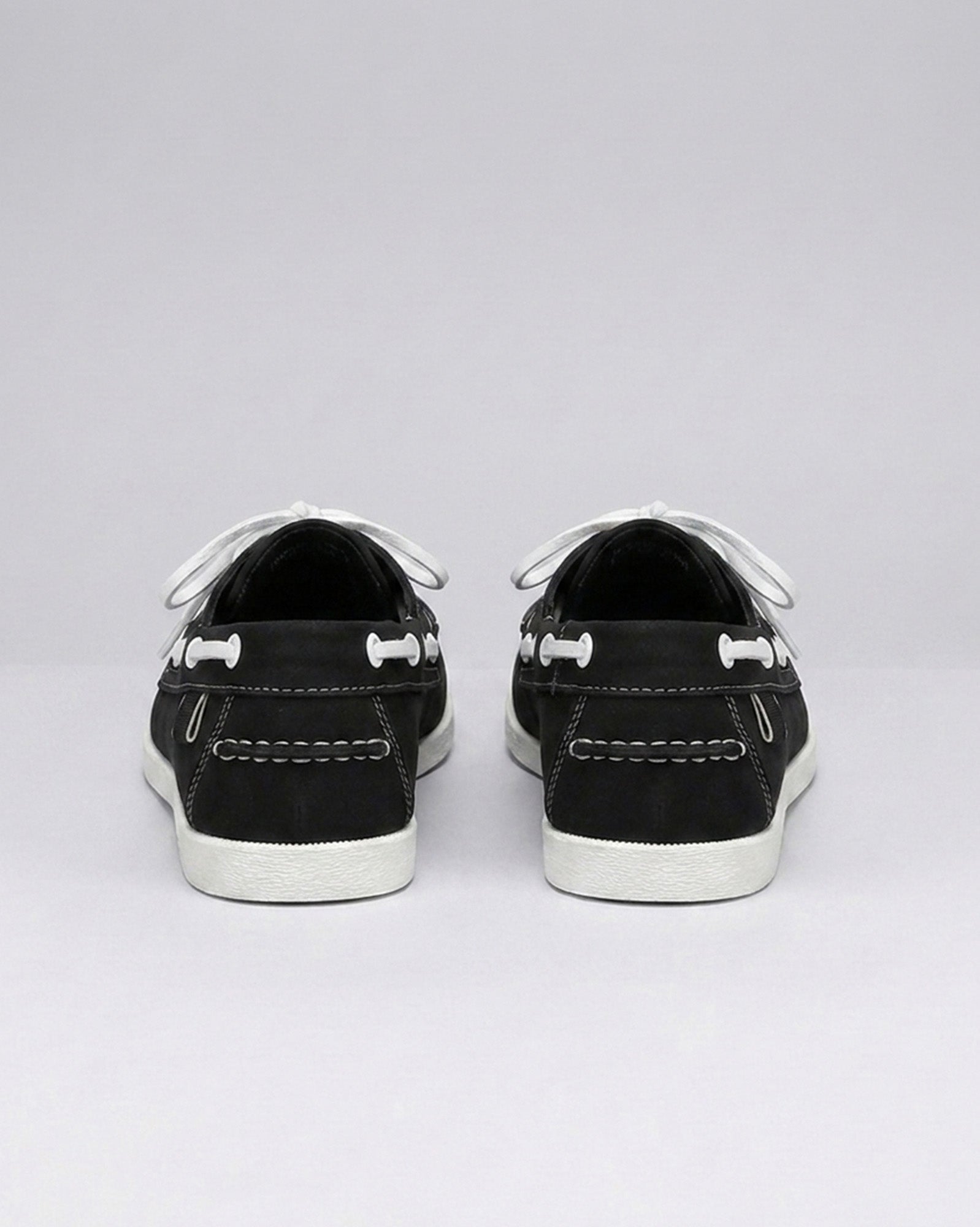 Nightdock men's black boat shoes - rear view with white outsole