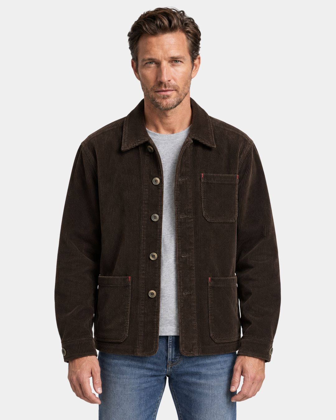 Men's brown corduroy chore jacket with a point collar, button front, and three patch pockets with red bar-tack details.