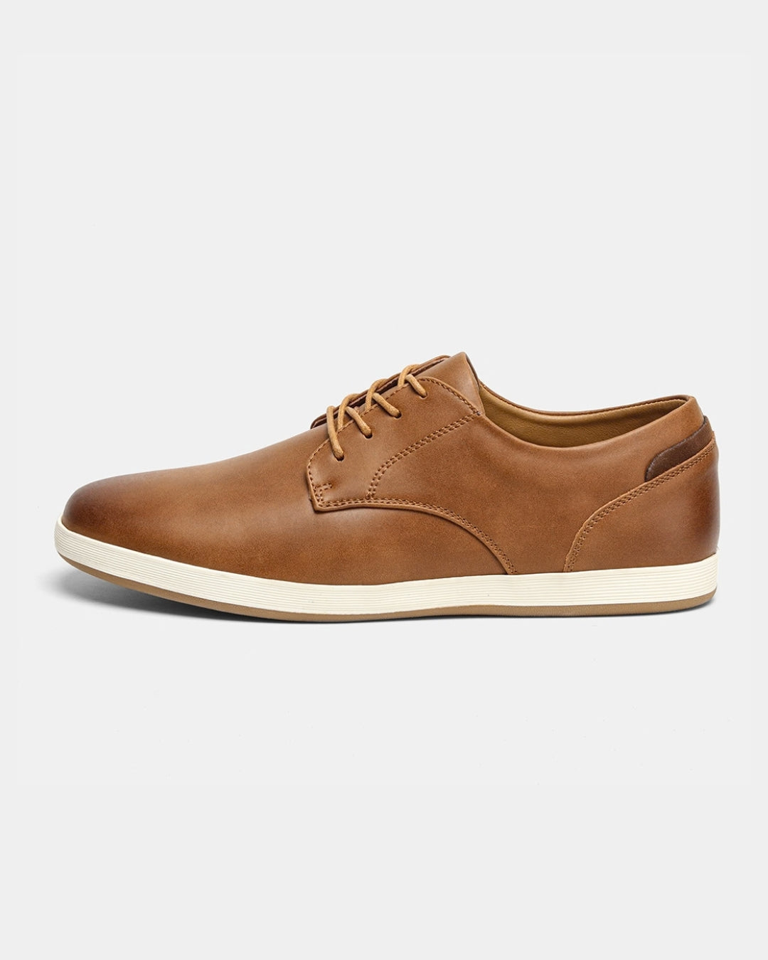 Cognac brown men's casual dress sneaker with a smooth synthetic upper, lace-up closure, and a white rubber sole.