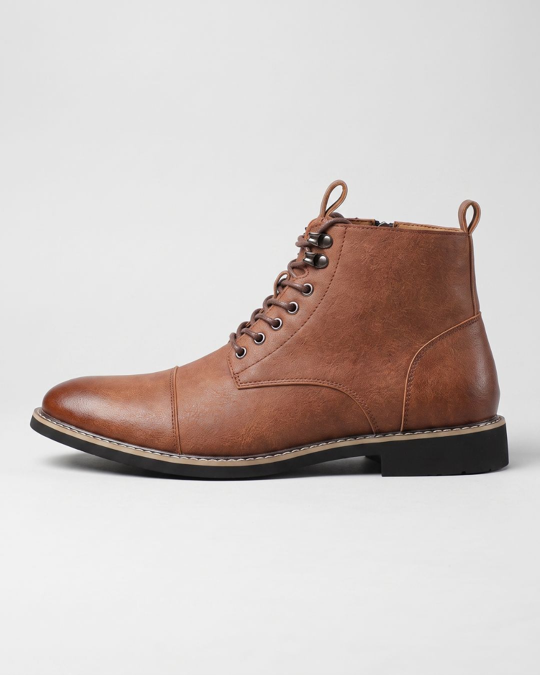 Brown leather cap-toe ankle boots with side zipper, lace-up front, metal eyelets, and a durable black rubber outsole.