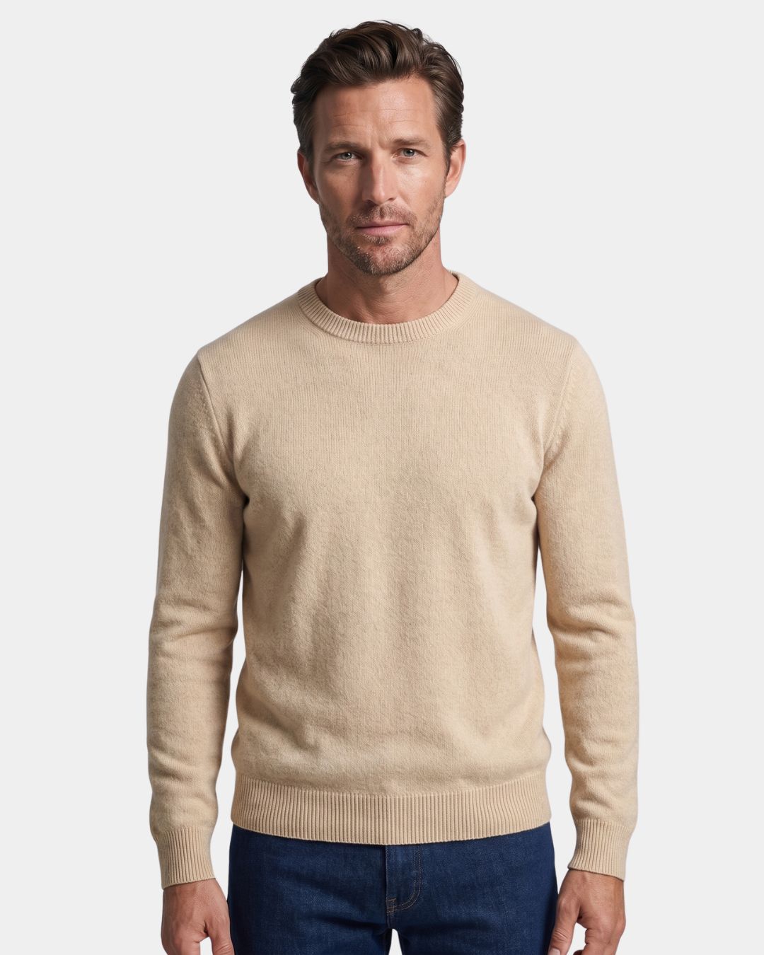 Man wearing a beige 100% wool crew neck sweater with ribbed trim and a clean, regular fit.