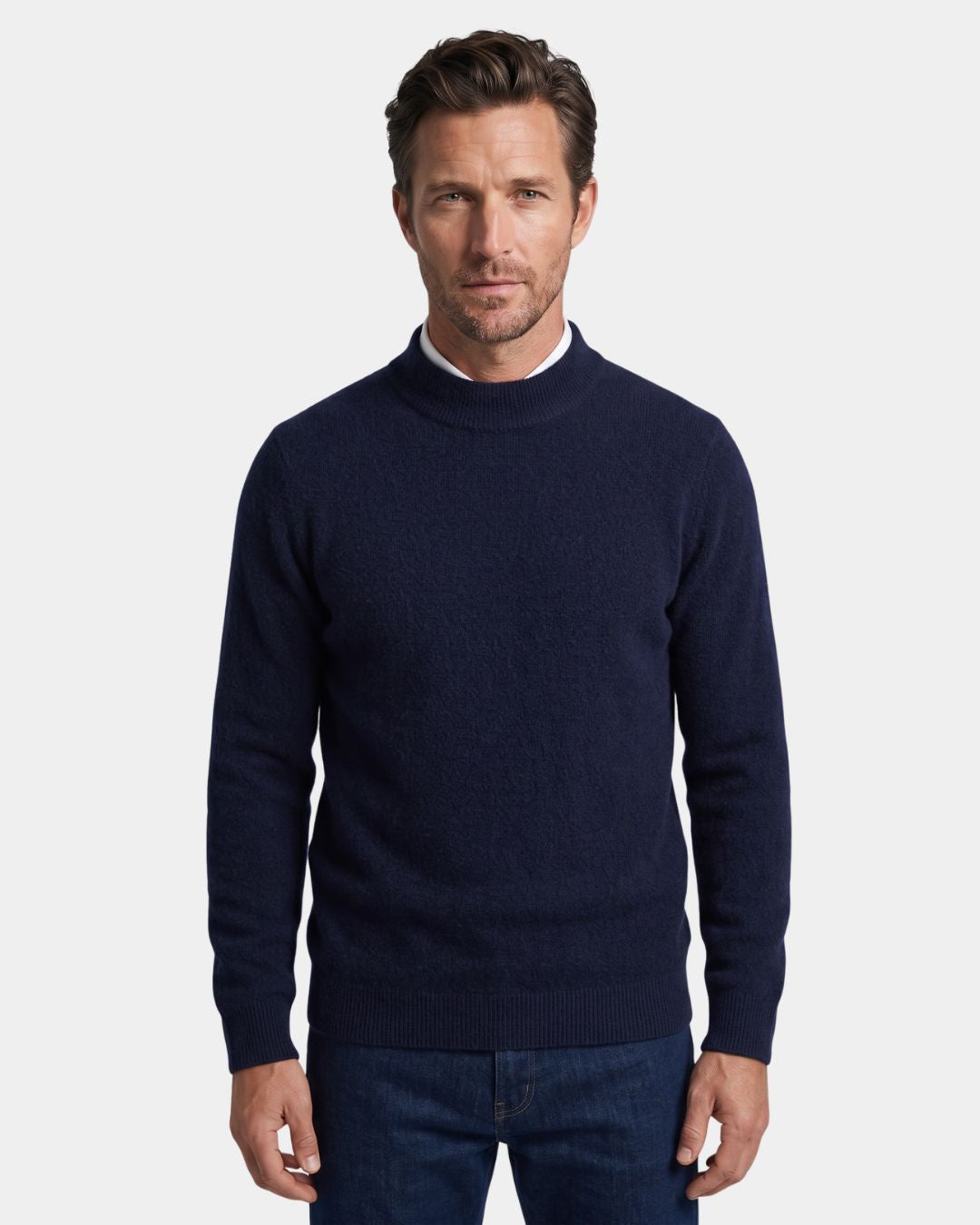 Men wearing a navy blue 100% wool mock neck sweater with a soft knit texture and ribbed cuffs against a white background.