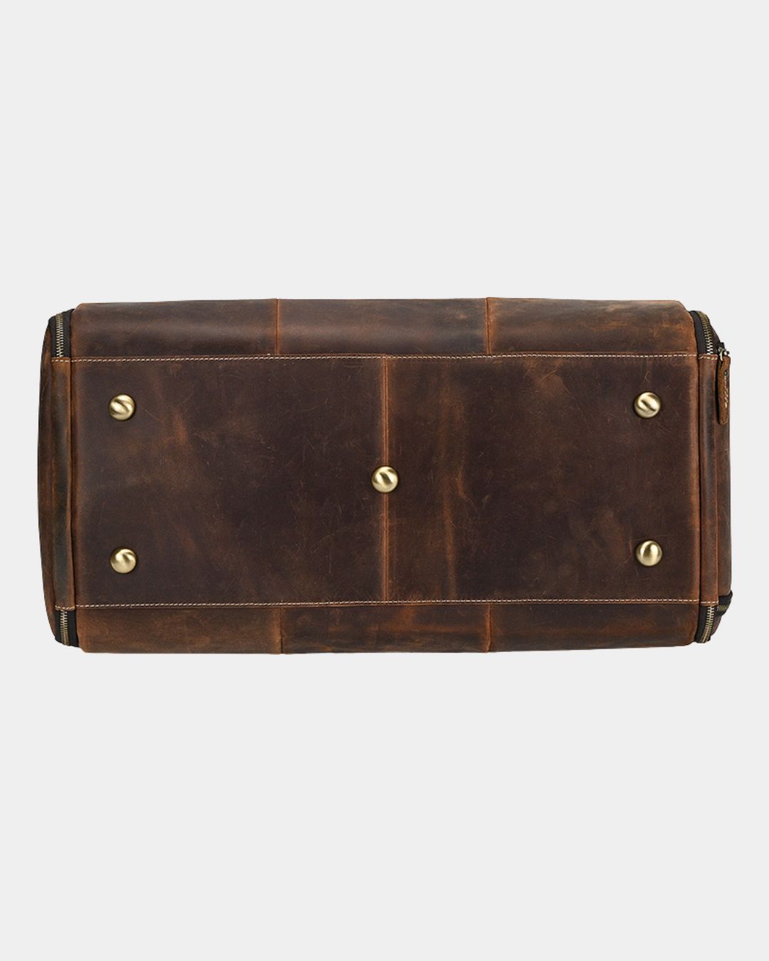Bottom view of a brown Crazy Horse leather travel duffel bag with five protective brass metal feet.