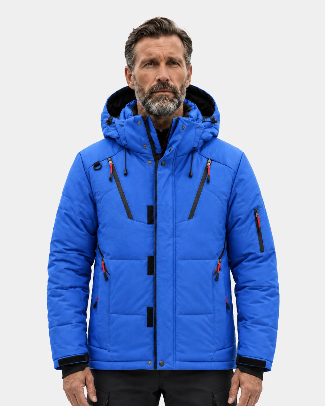 Man wearing a bright blue down puffer ski jacket with a detachable hood, zip pockets, and adjustable cuffs.