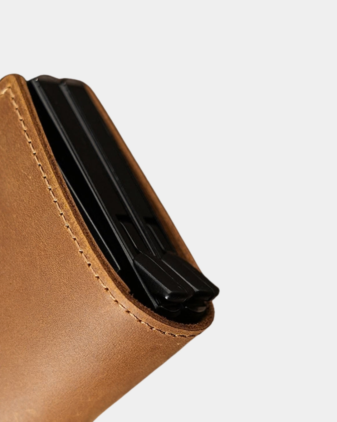 Tan genuine cowhide leather wallet featuring a black automatic pop-up card holder mechanism for quick access.