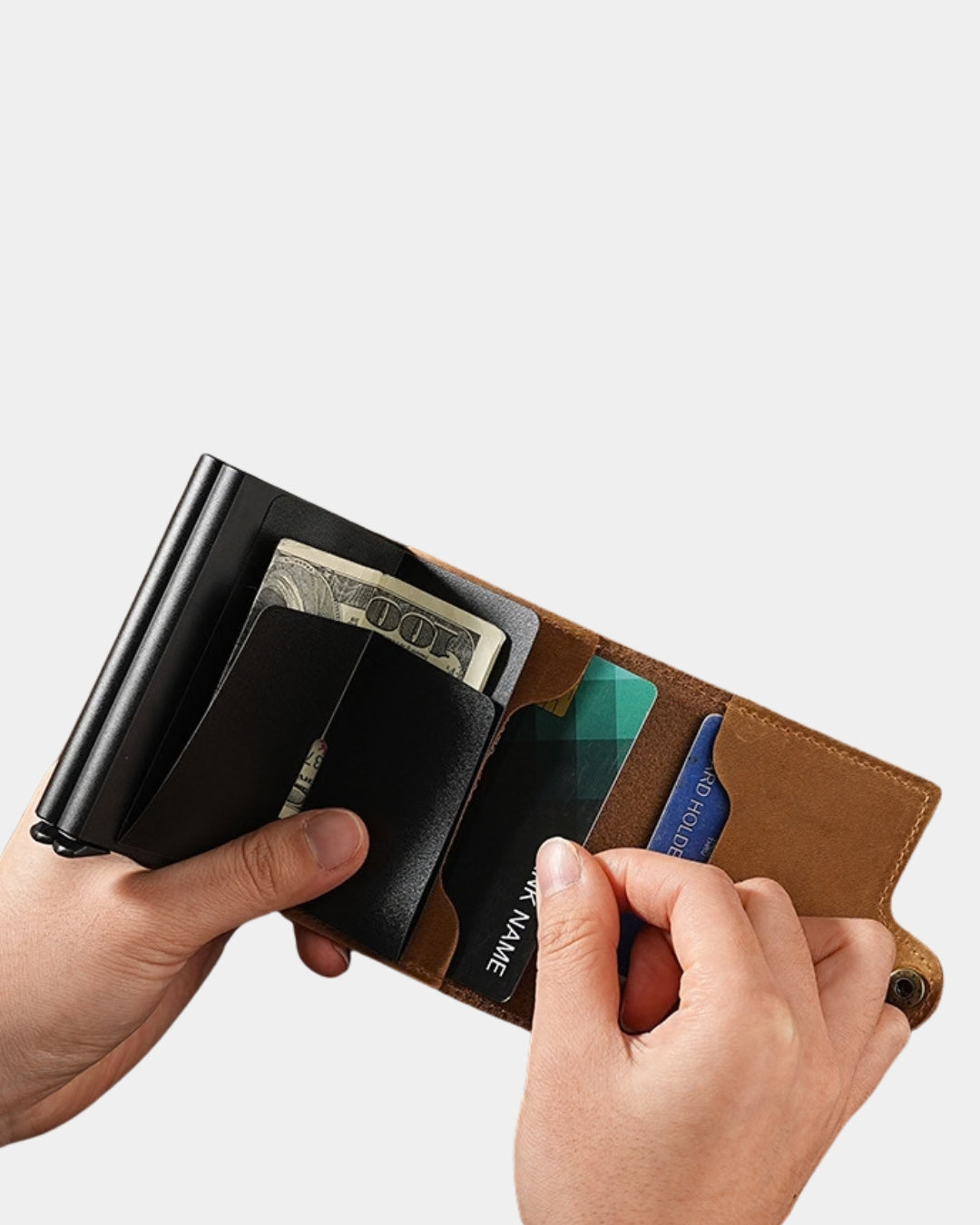 Brown genuine leather pop-up card wallet with a black metal card holder, cash slot, and snap-button closure held in hands.