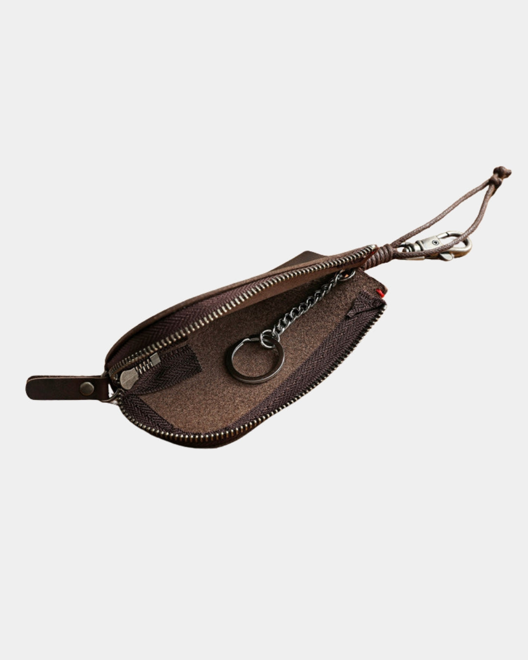 Compact brown genuine cowhide leather key wallet with a zippered compartment, internal key ring, and metal clip attachment.