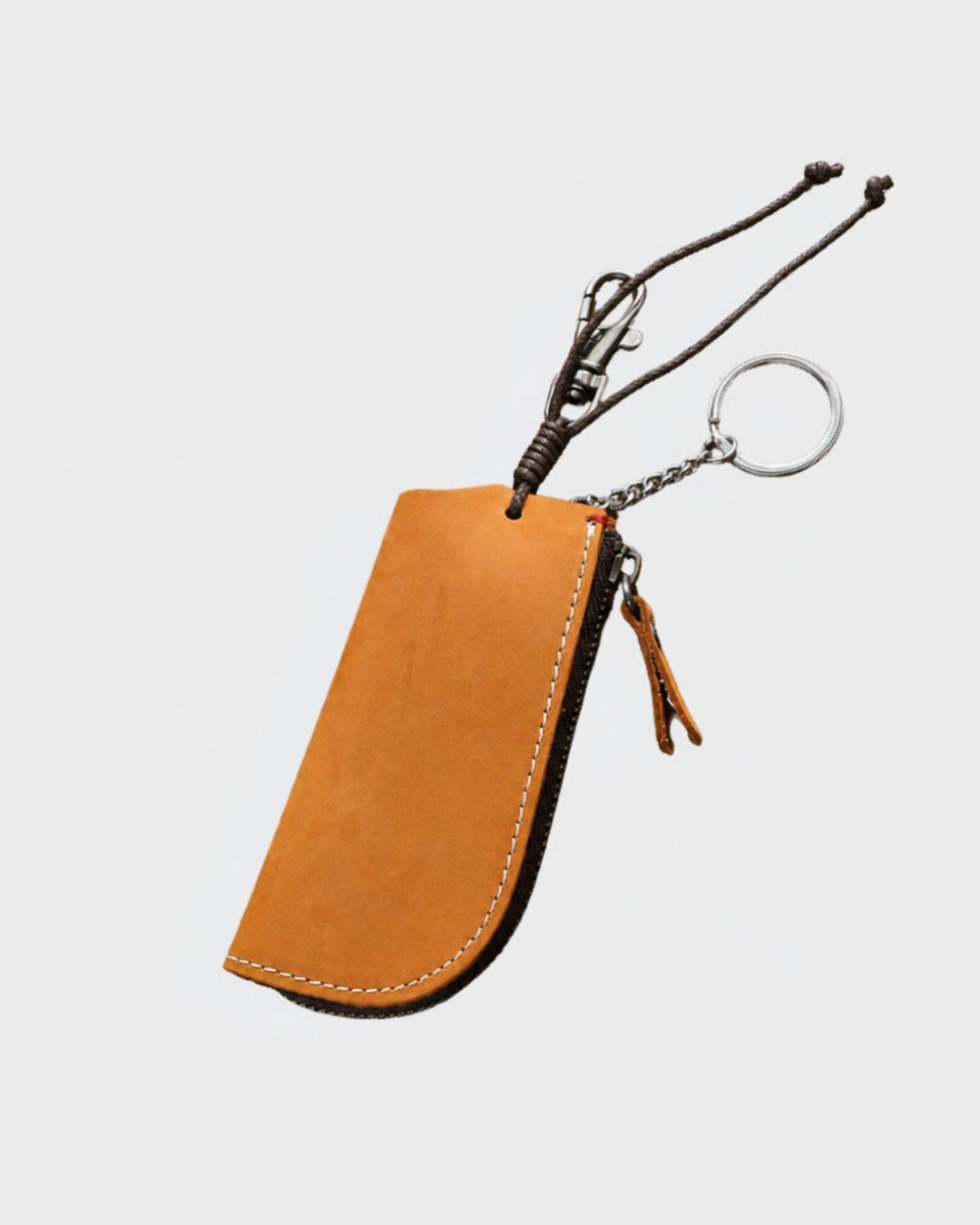 Tan genuine cowhide leather key wallet with a zippered compartment, metal key ring, and clip on a white background.
