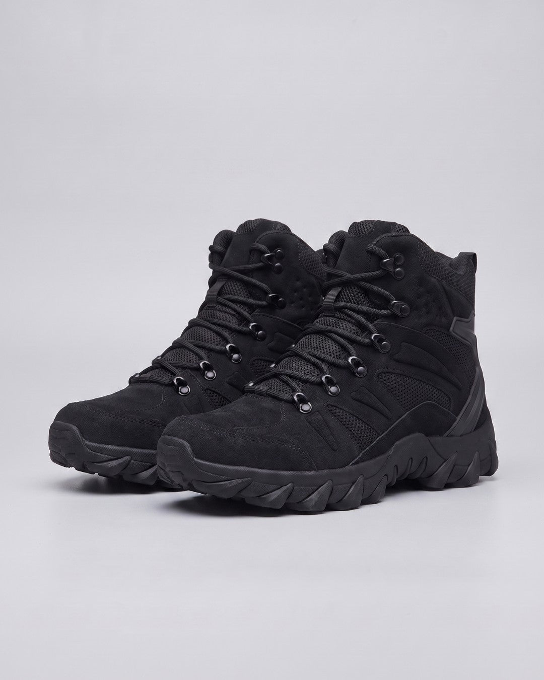 Angled view of mens black hiking tactical combat boots  by Hudson & Tate.