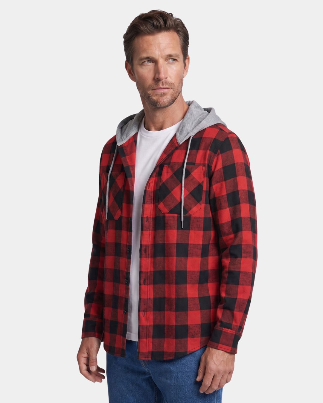 Man wearing a red and black plaid flannel shirt with a grey drawstring hood, button front, and dual chest pockets.