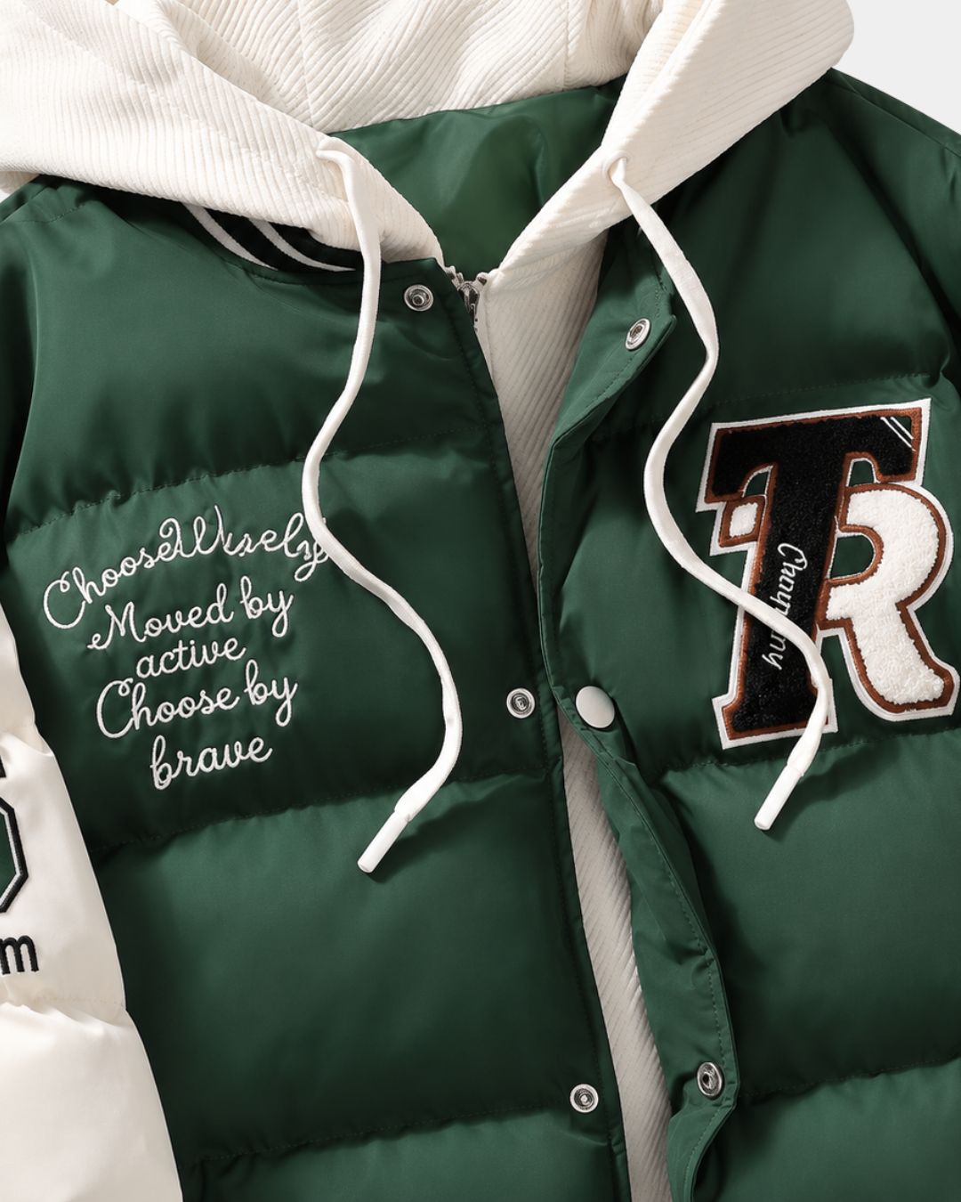 Green and white hooded varsity puffer jacket with embroidered patches, full-zip front, and snap-button closure.