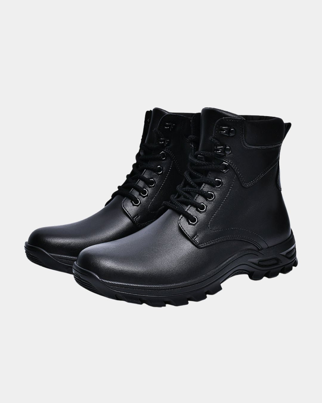Black cowhide leather combat boots with lace-up closure, padded collars, and chunky lug rubber outsoles.