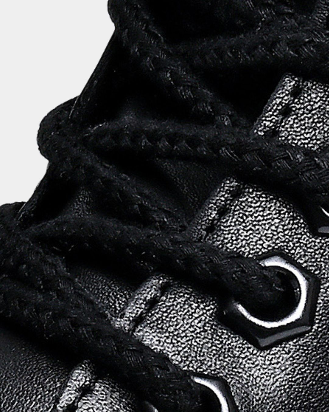 Close up of the laces and leather of a Men’s black cowhide leather lace-up combat boots 