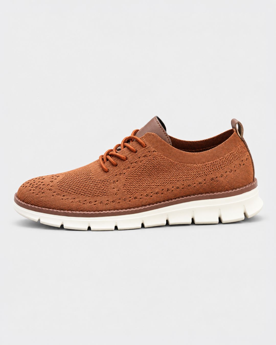 Brown breathable mesh dress sneaker with a lace-up design and a comfortable white cushioned EVA sole.