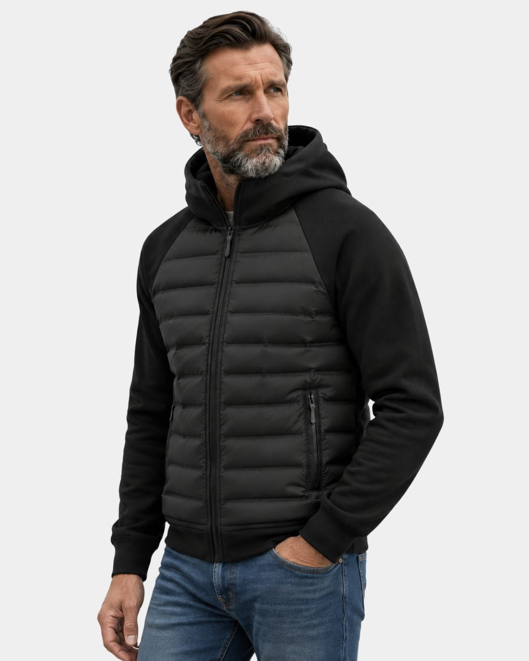 Men’s black hybrid puffer jacket with a quilted down body, soft knit sleeves, hood, and zip pockets.