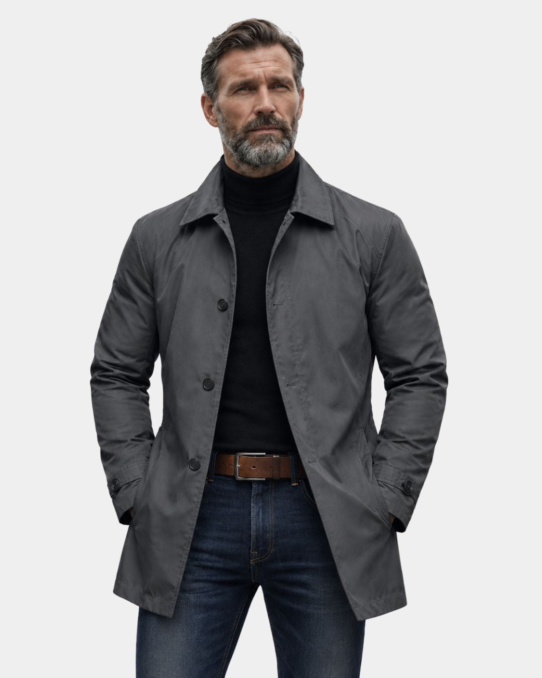 Man wearing a charcoal grey lightweight short trench coat with a button-front, tailored car coat silhouette.