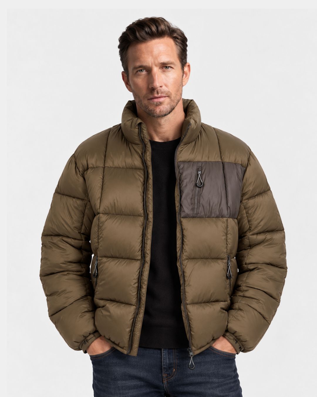 Olive green padded puffer jacket with a stand collar, chest zip pocket, and relaxed fit worn by a man.