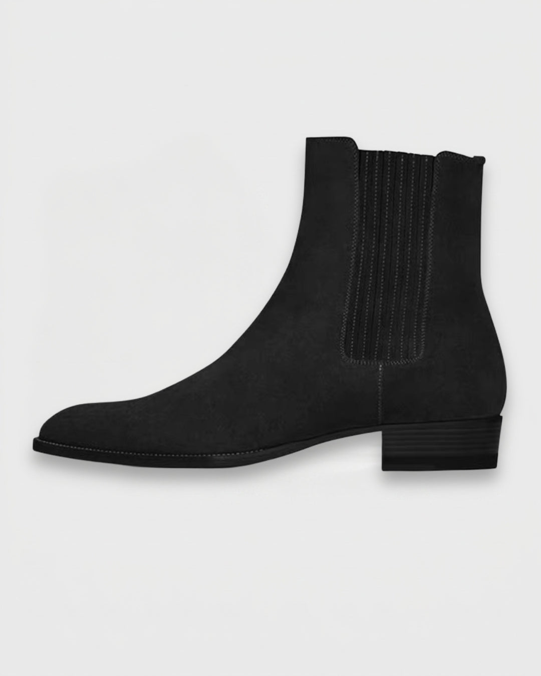 Black suede Chelsea boots with a pointed toe, elastic side panels, and a low heel on a light background.