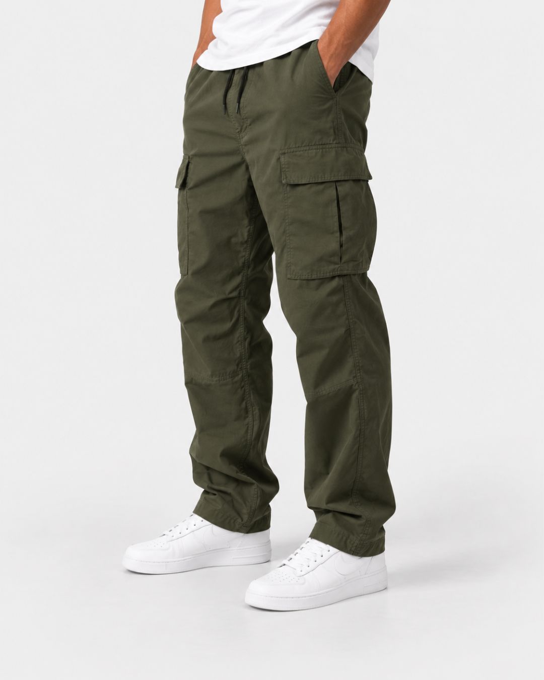 Men’s olive green relaxed-fit cargo pants with large flap pockets, an elastic drawstring waist, and adjustable hems.