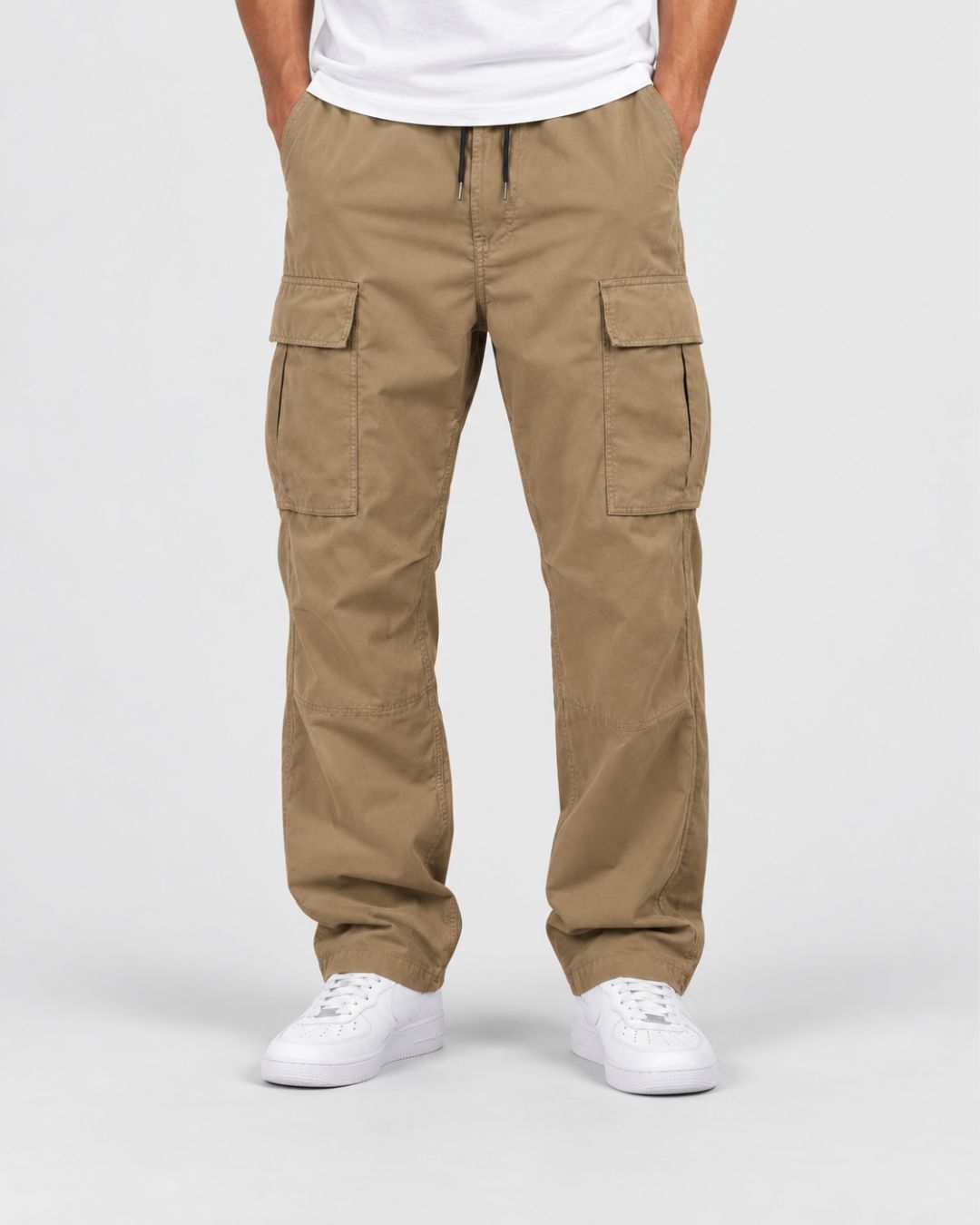 Men’s relaxed-fit khaki cargo pants with an elastic drawstring waist and large side flap pockets.