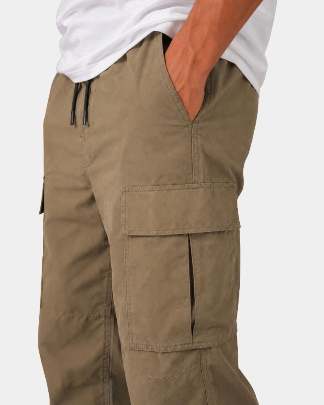 Relaxed fit olive green cargo pants with an elastic drawstring waistband and large side flap pockets.