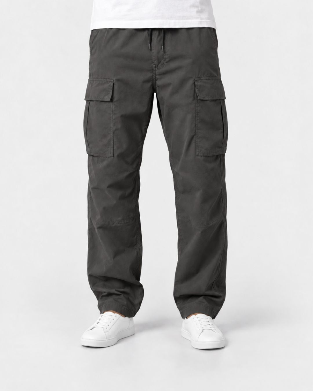 Charcoal grey men’s relaxed-fit cargo pants with side flap pockets, an elastic drawstring waist, and adjustable hem cords.