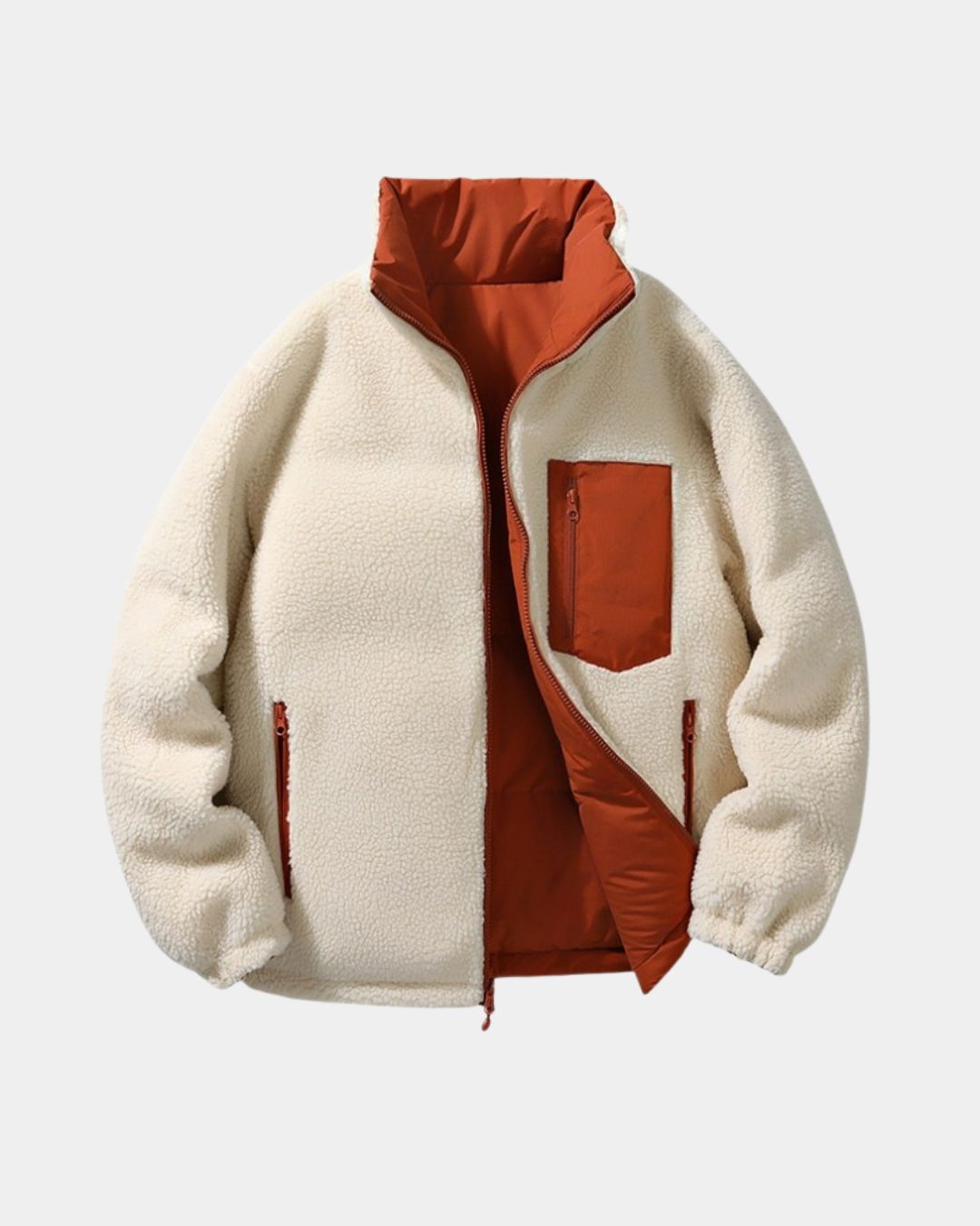 Men’s reversible puffer jacket featuring cream-colored fleece on one side and a rust-orange padded shell with zip pockets.