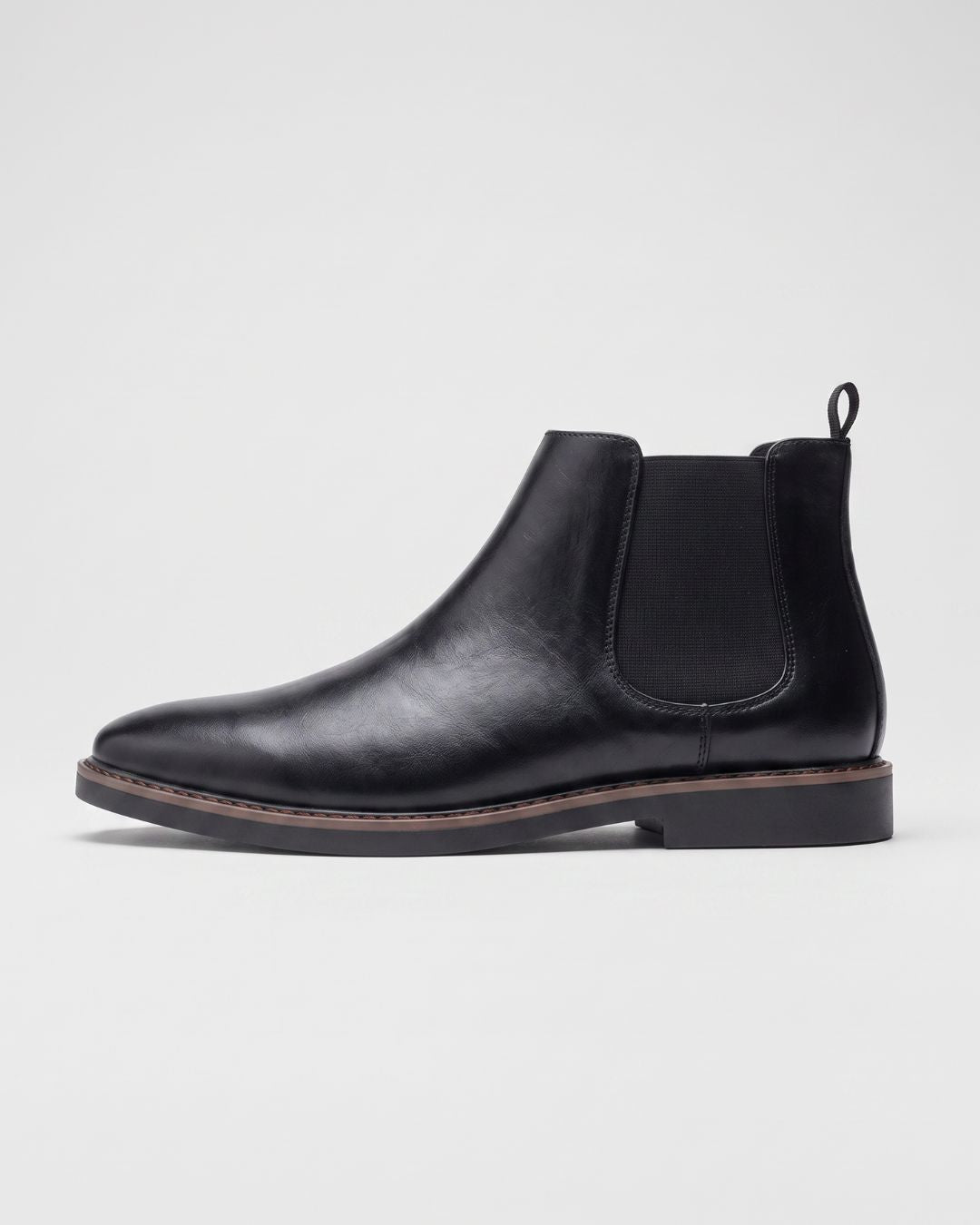 Mens black slip on chelsea boots london style in side view 