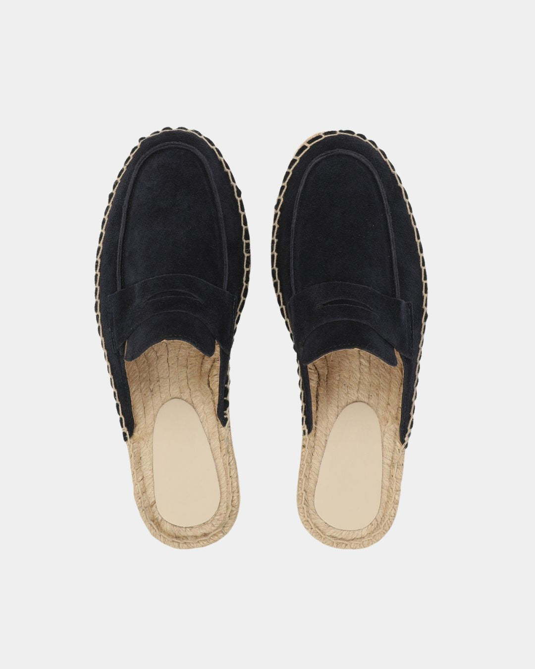 Men's black suede mule slippers featuring a woven espadrille sole and a comfortable slip-on design.