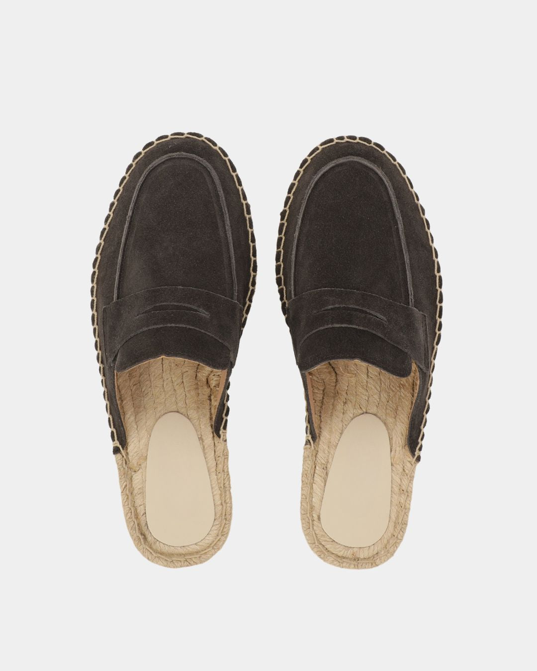 Men's dark brown suede mule slippers featuring a woven espadrille-style sole and a comfortable slip-on design.