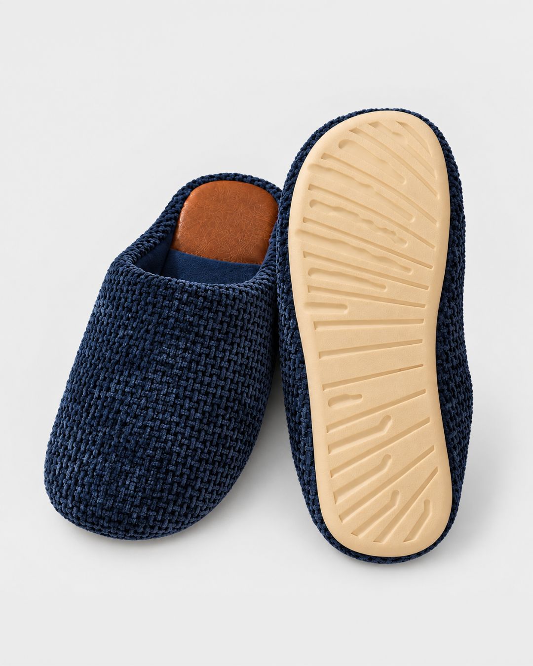 Navy blue textured house slippers with a brown suede heel patch and a thick, non-slip beige TPR sole.