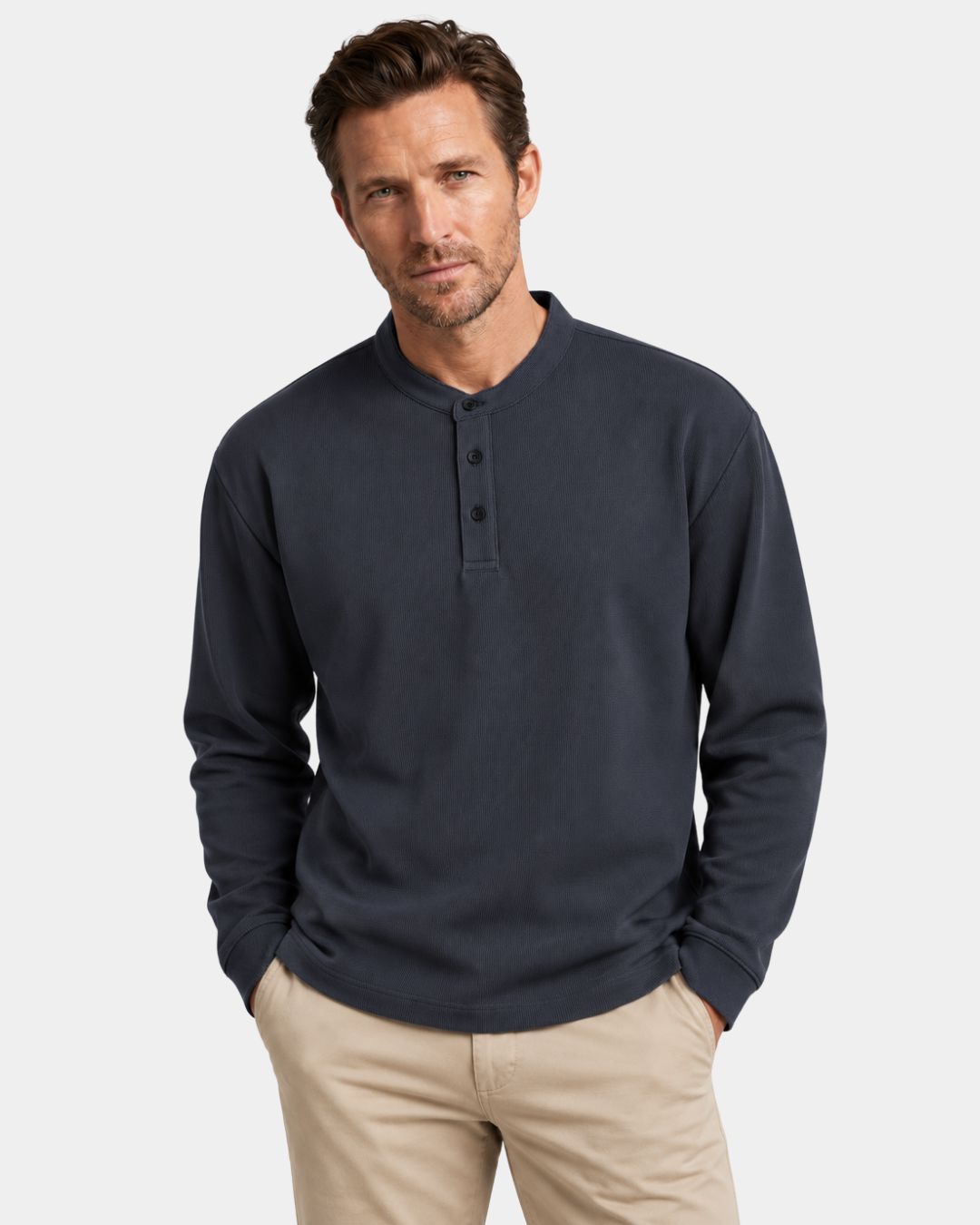 Men's charcoal grey long sleeve henley shirt in a textured waffle knit with a three-button band collar and dropped shoulders.