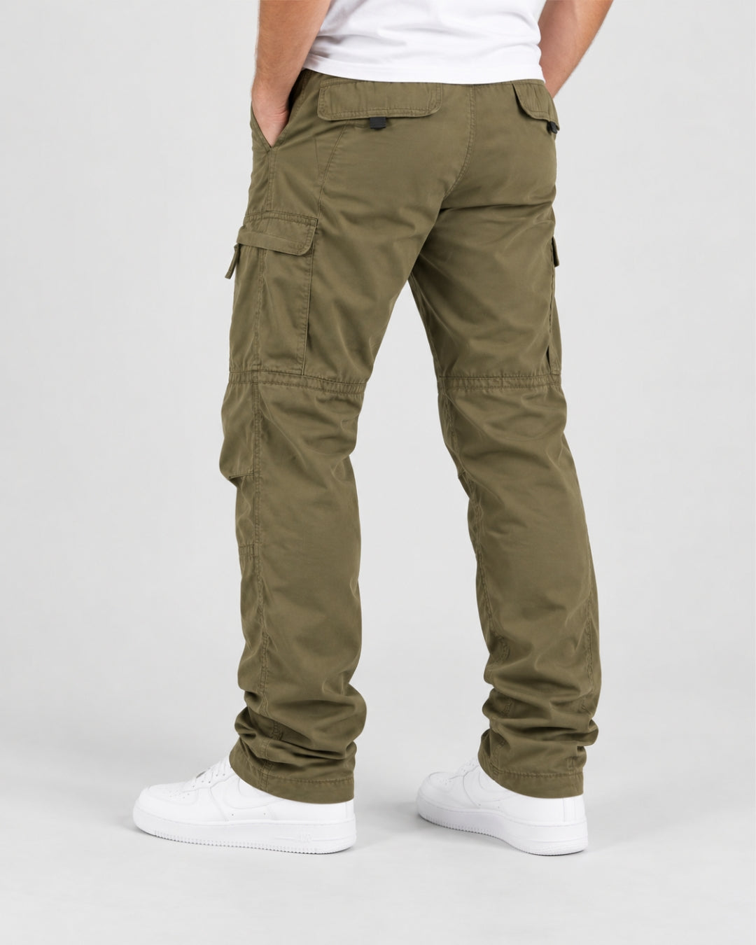 Men’s olive green fleece-lined cargo pants with a relaxed fit, side cargo pockets, and knee seam detailing.