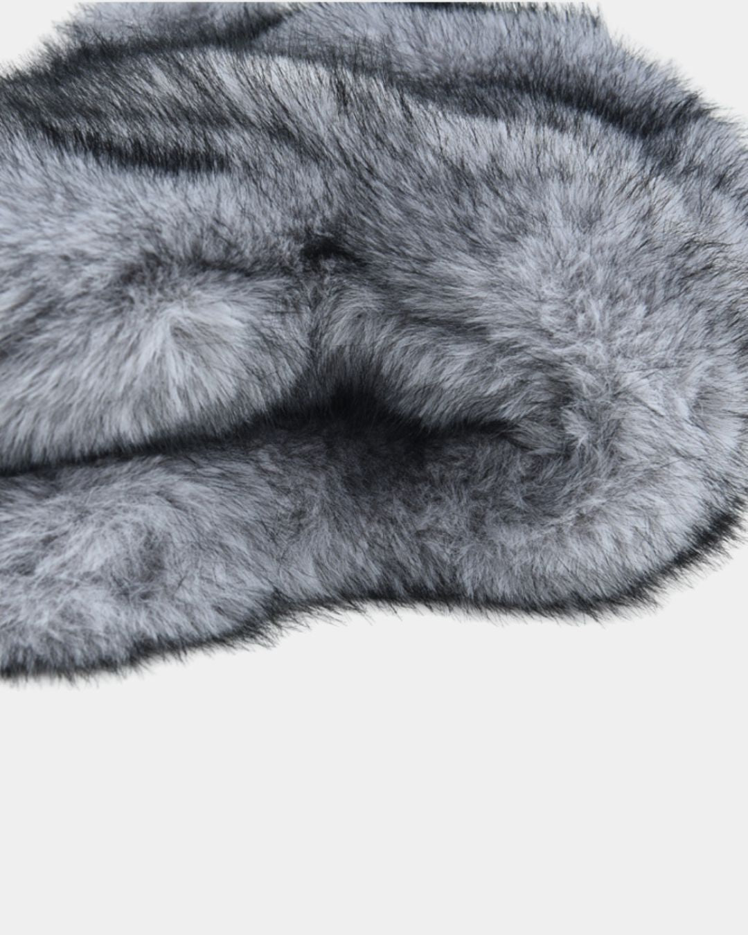 Grey and black plush ushanka trapper hat with soft, thick faux fur texture for winter warmth.