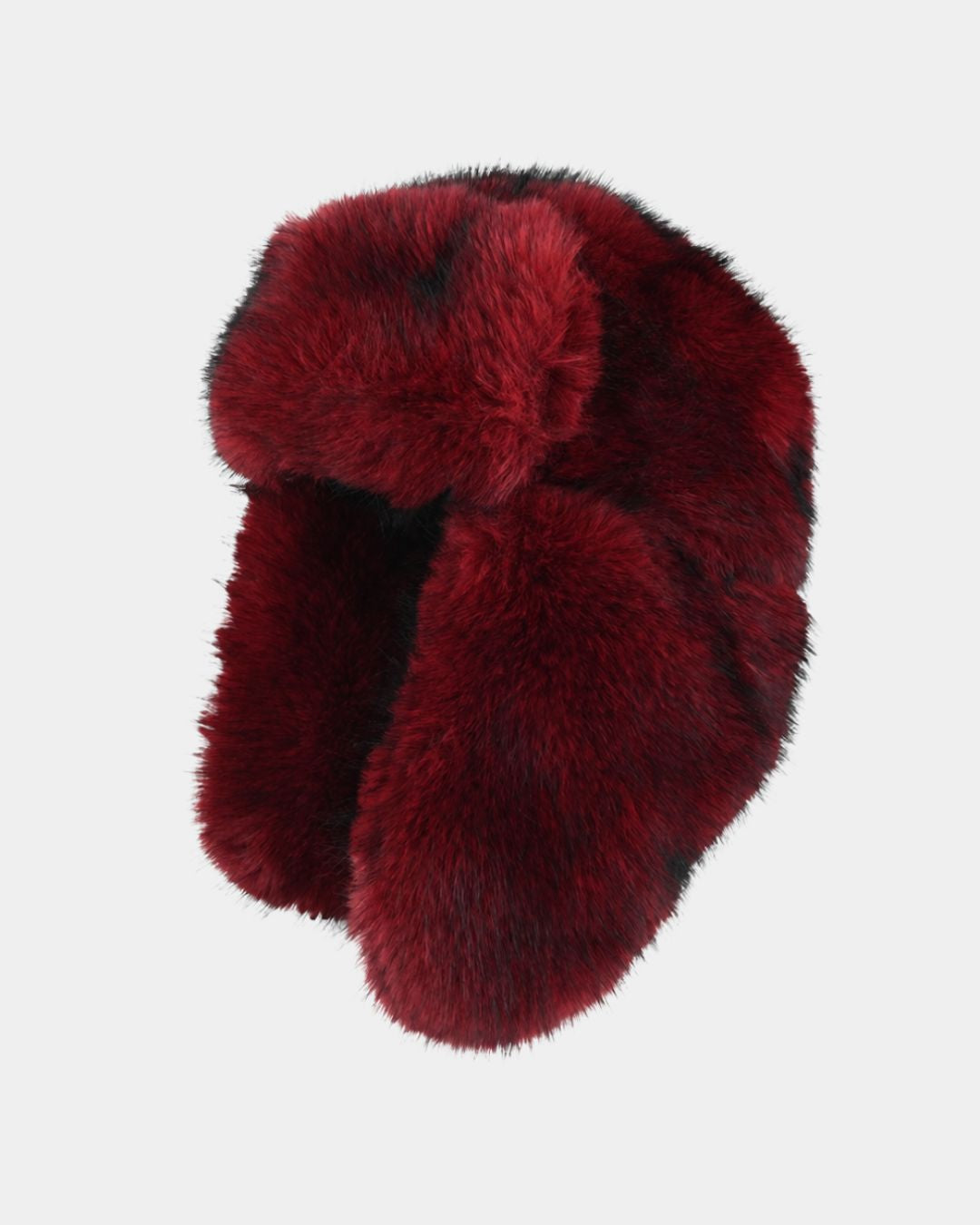 Deep red plush ushanka trapper hat with soft ear flaps for winter warmth and wind protection.