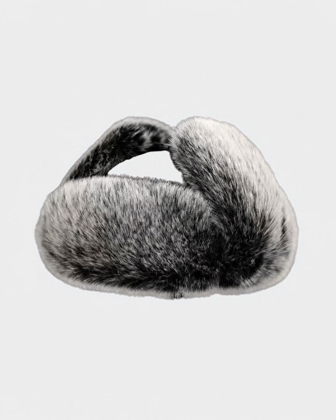 Men’s black and white faux fur ushanka trapper hat with plush lining and folded ear flaps for winter warmth.