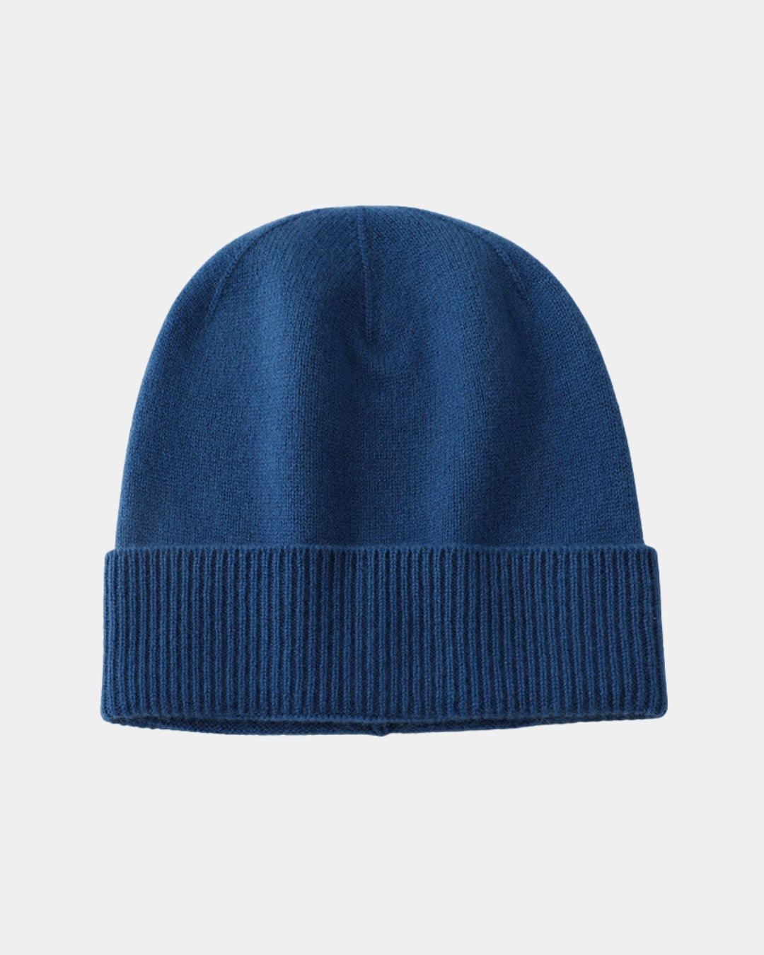 Classic blue men’s wool beanie featuring a soft knit texture and a structured ribbed fold-over cuff.