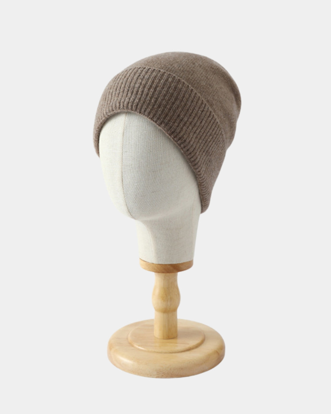 Classic brown wool cuffed beanie with a ribbed knit design on a mannequin head.