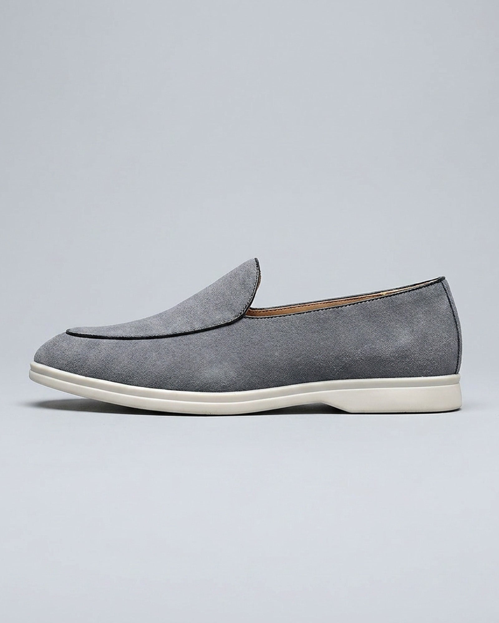 Side view of Milan men's stone grey suede slip-on loafer