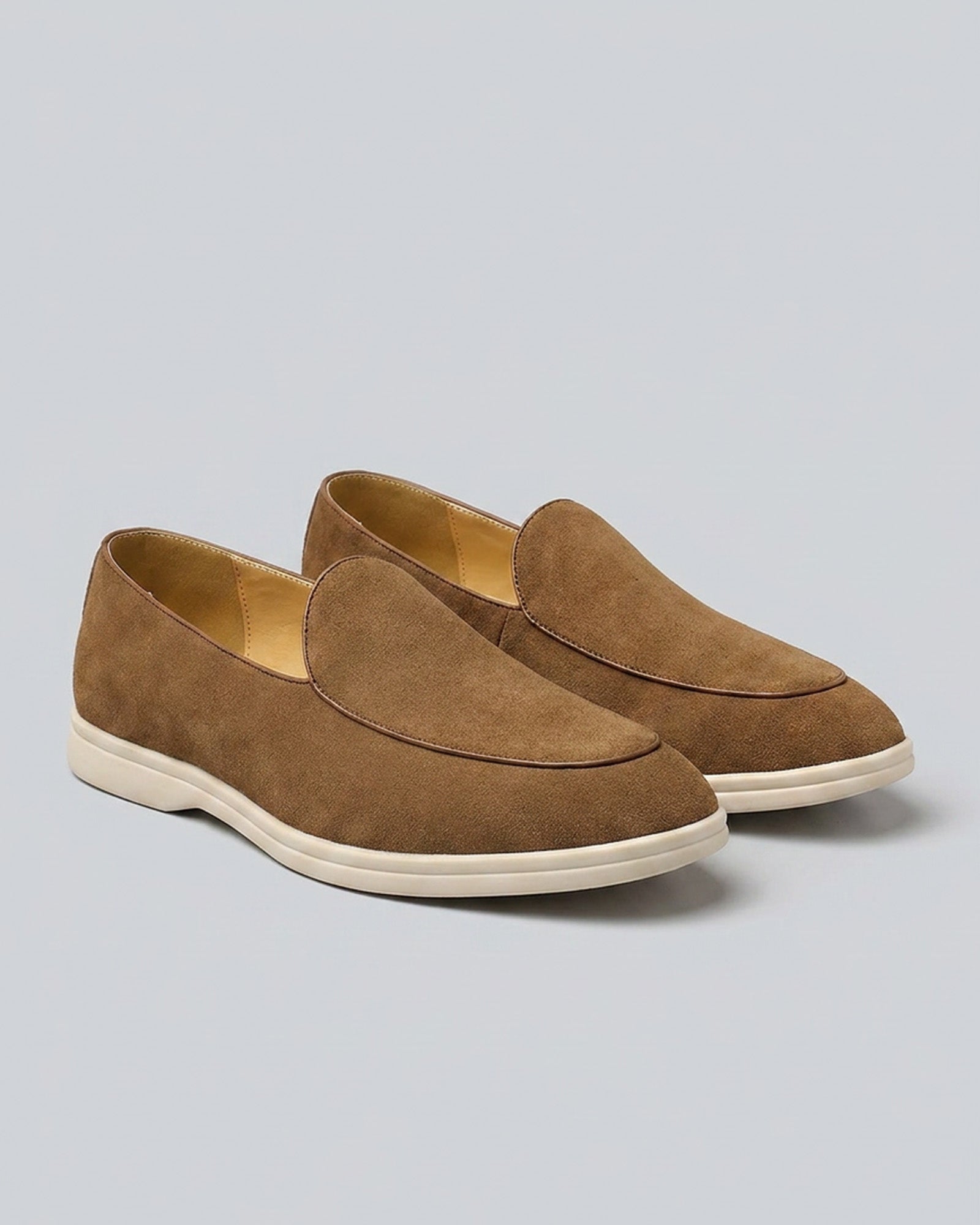 Pair of Milan men's tan suede slip-on loafers